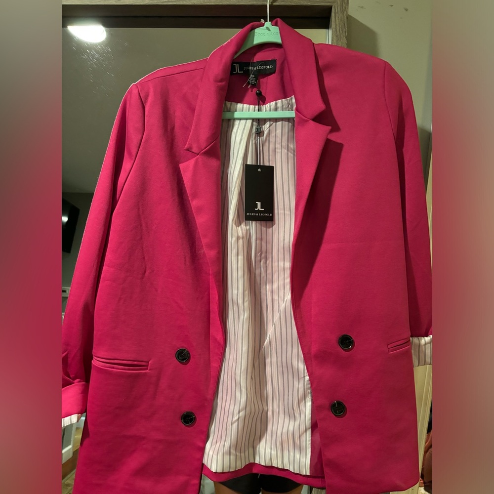 Pink blazer  striped silk inside . Hip length .
